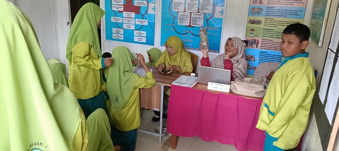 Anggota PMR MTsN 2 Bungo Lakukan Pemantapan Program Kerja di Ruang PMR Anggota PMR MTsN 2 Bungo Lakukan Pemantapan Program Kerja di Ruang PMR
